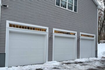 Three commercial garage door installation