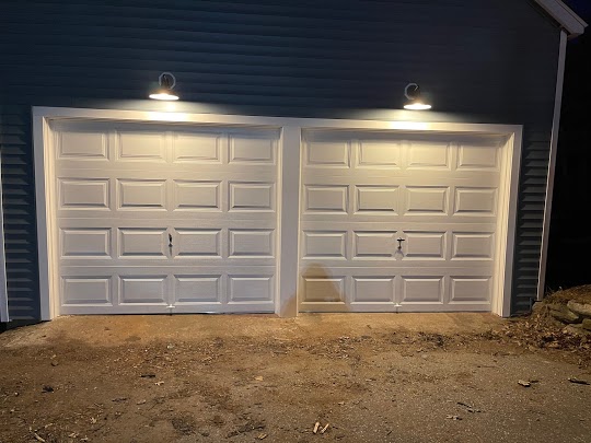 Double garage door: (2) 8’0″ x 7’0″ Clopay Model 4050 Steel Insulated Doors.