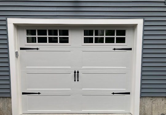 Haas Steel Insulated Carriage House Door with Decorative Hardware