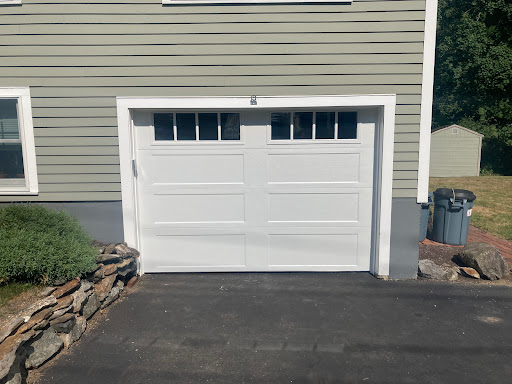 9’0″ x 7’0″ Steel Insulated 1 3/8” Thick Doors. Short Raised Panel. Synergy 270 1/2 HP Belt Drive Opener.