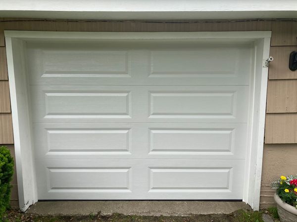 Installation in Southboro, MA! 9′ 0″ x 7’0″ Steel Insulated Garage Doors.