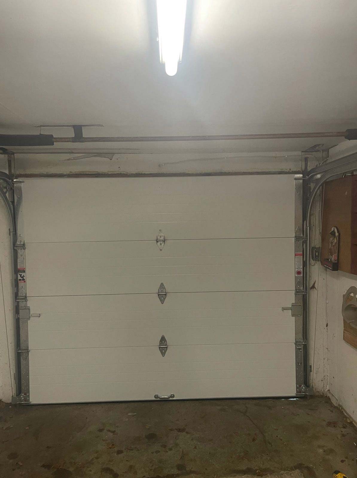 9’0″ x 8’0″ Haas Model 2063 Steel Insulated Garage Doors.
